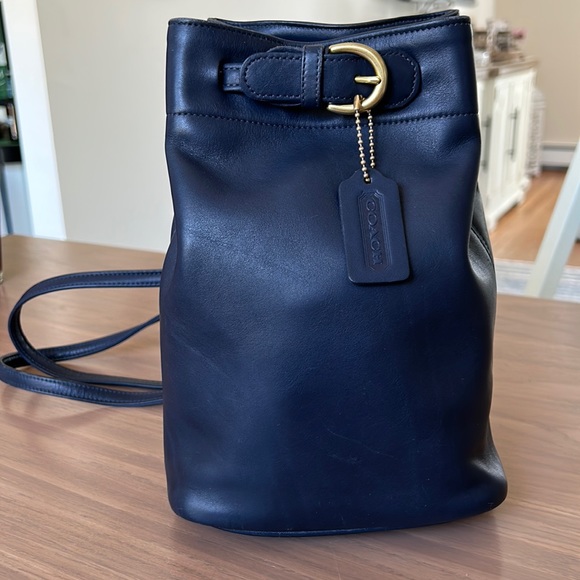 Coach Handbags - Vintage Coach Soho Navy Blue Leather Sling Backpack